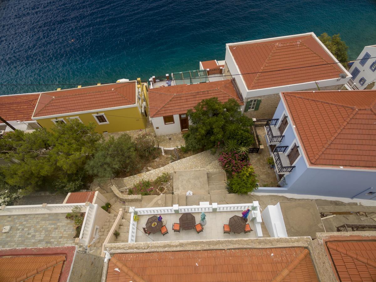 Roulas Apartments Chalki Town Exterior foto