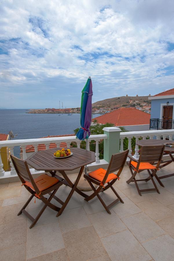 Roulas Apartments Chalki Town Exterior foto